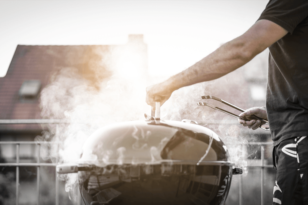 Alsip Nursery smoking turkey on a grill