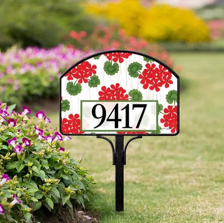 Studio M, Red Geraniums Yard Design